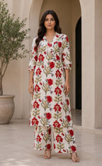 Shinyora red floral print cotton kurta set with V-neck and matching wide-leg pants worn by a woman in a neutral setting.